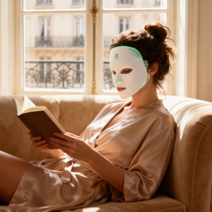 Woman wearing the AuraLED Light Therapy Face Mask