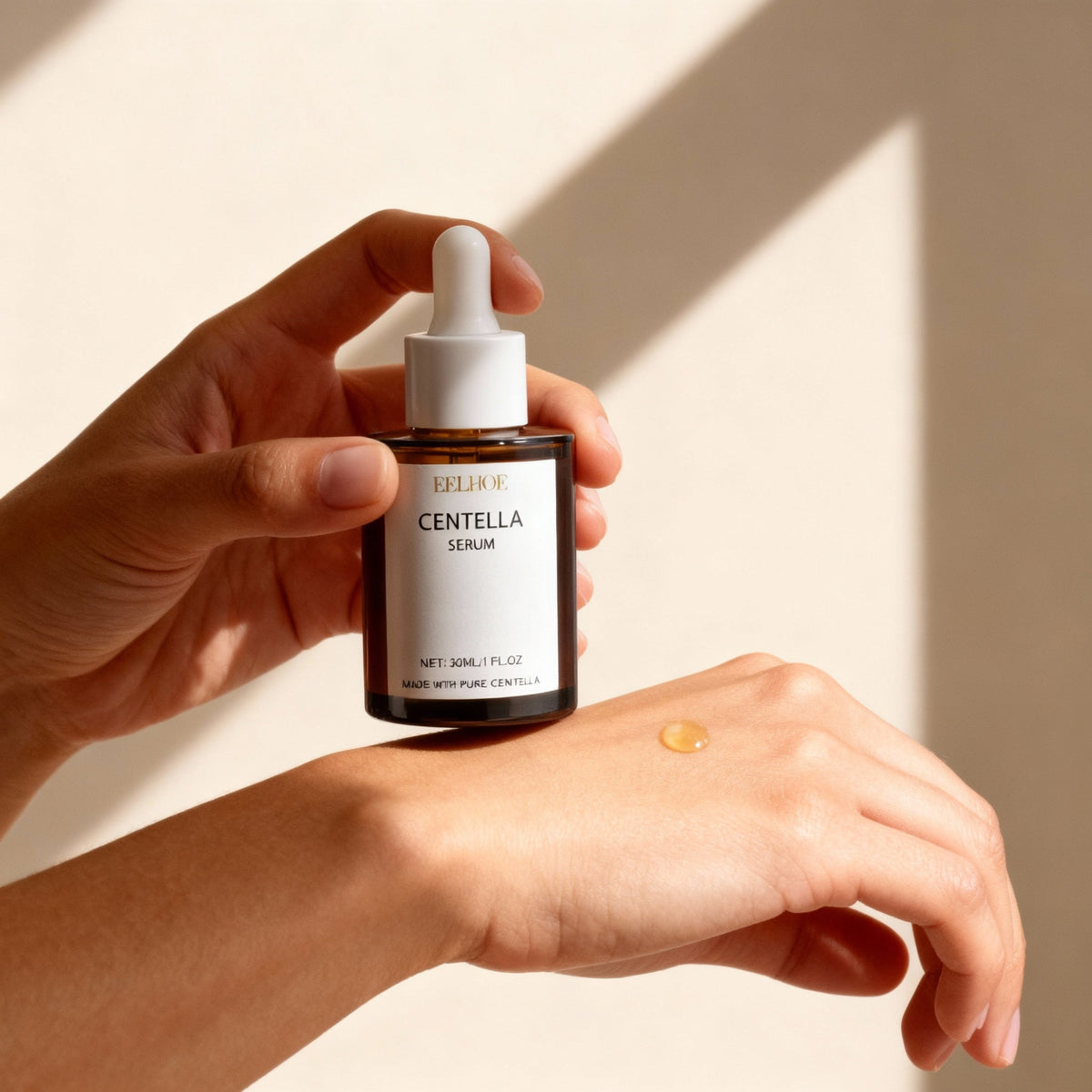 Dropper releasing a droplet of DermaCentella Hyaluronic Acid Serum