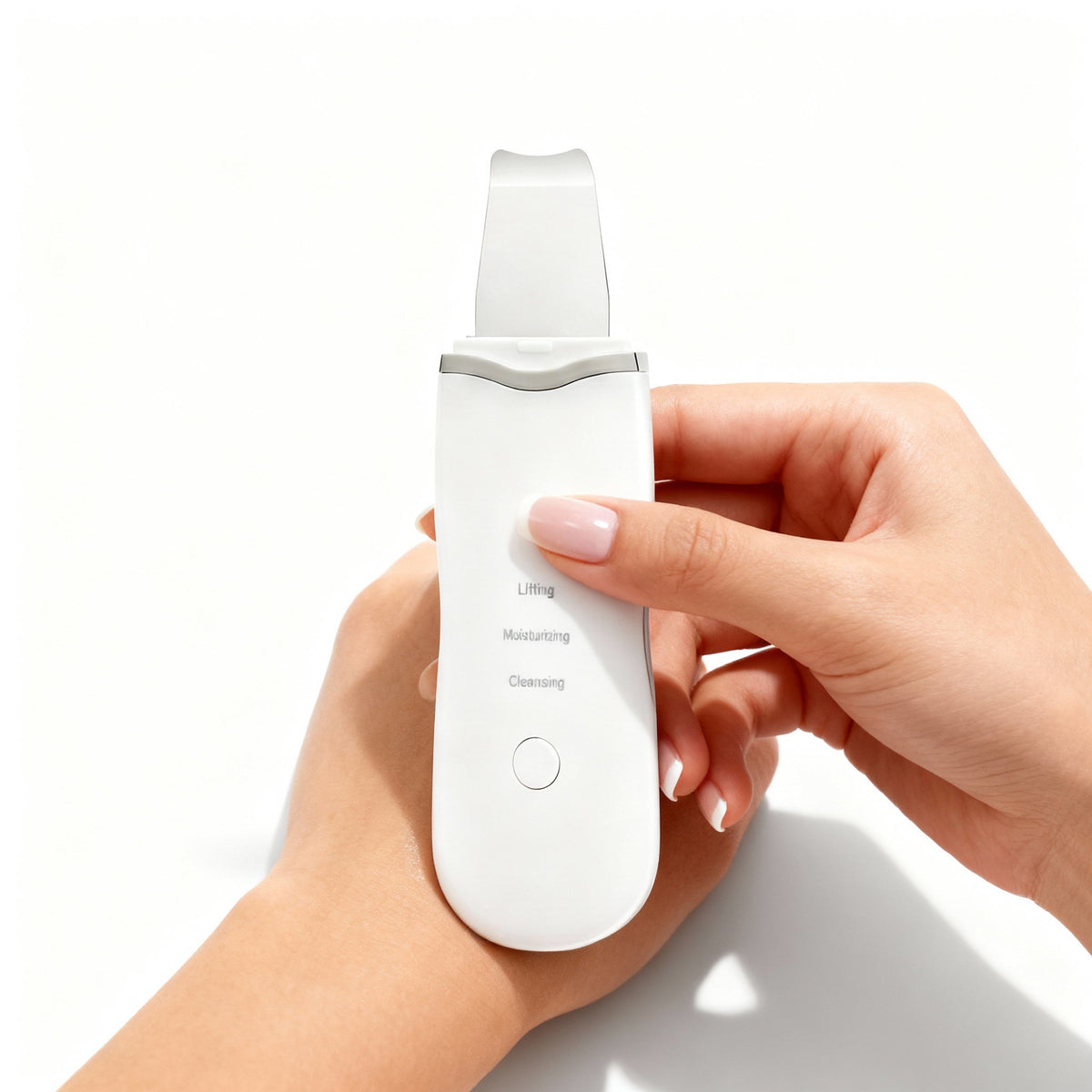 Hand holding the NovaPeel Ultrasonic Skin Scrubber