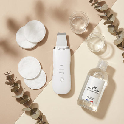 Flat lay of the NovaPeel Ultrasonic Skin Scrubber
